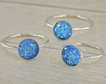 aqua aura quartz rings