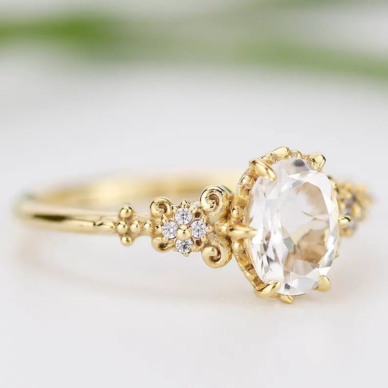 white topaz engagement rings